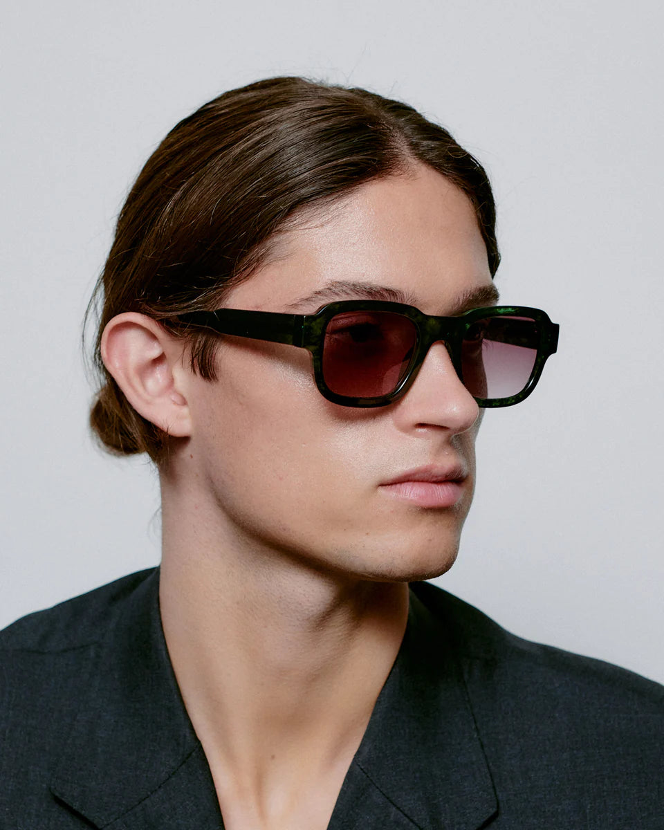 Heliotique Halo Sunglasses - Dark Green Transparent