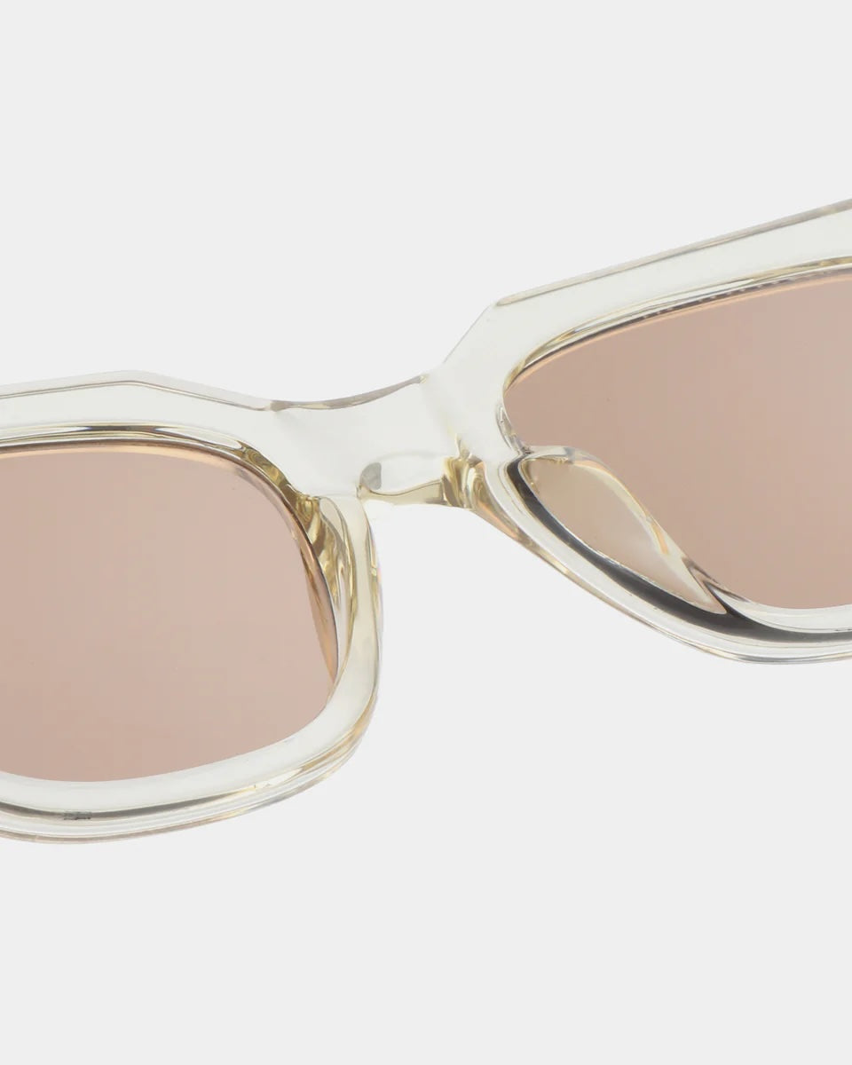 Heliotique Kaws Sunglasses - Ecru Transparent