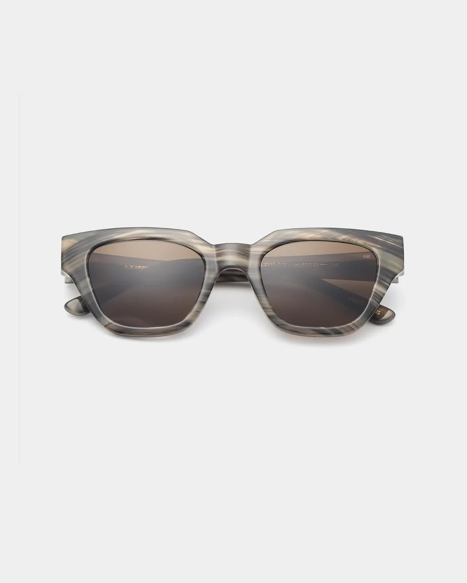 Heliotique Kaws Sunglasses - Striped Horn