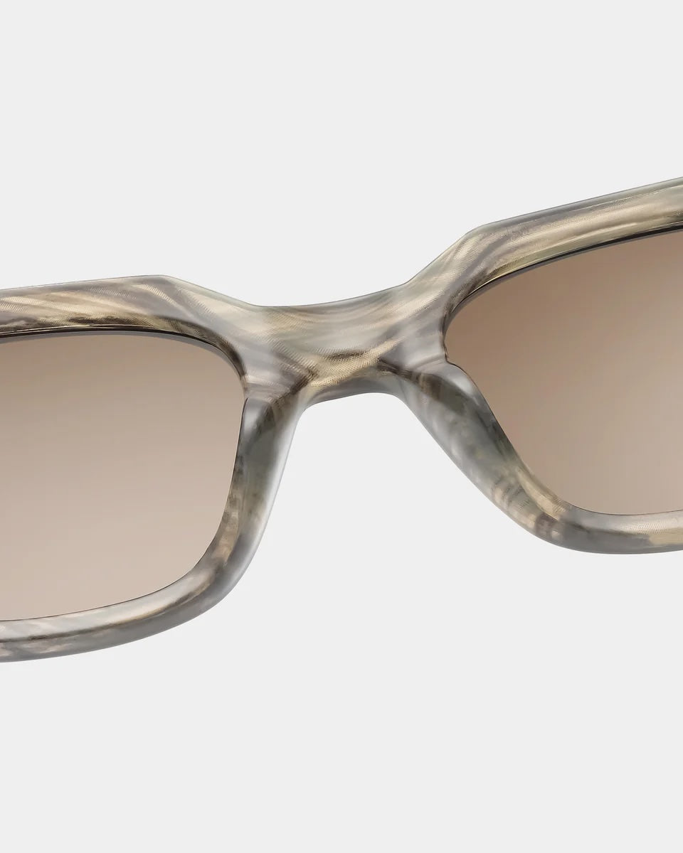 Heliotique Kaws Sunglasses - Striped Horn