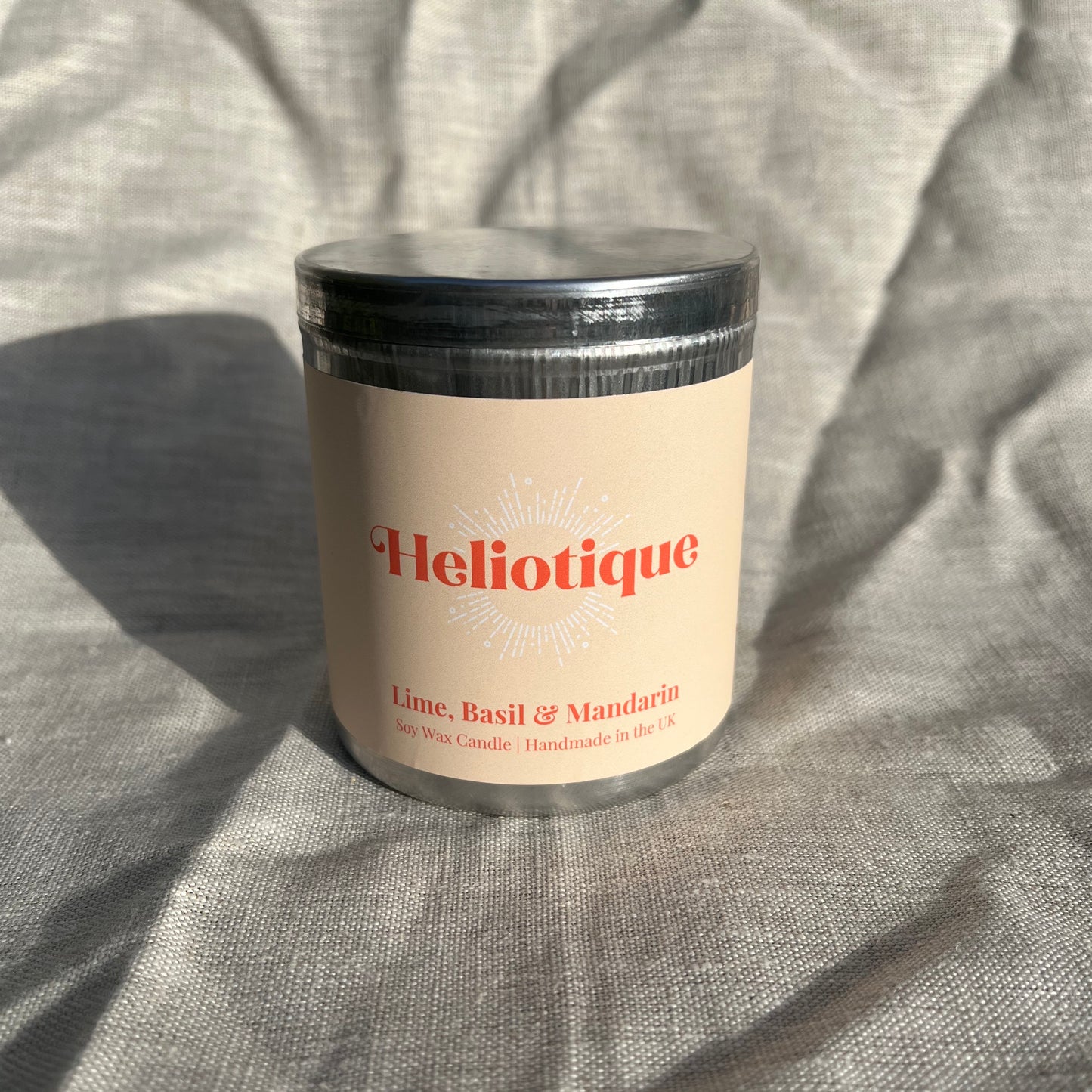 Heliotique | Heliotique Candle - Lime, Basil & Mandarin Tin Candle