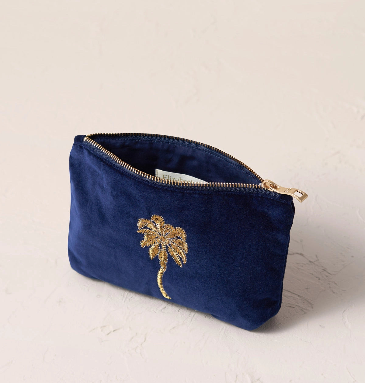 Heliotique | Elizabeth Scarlett Gold Palm Mini Pouch - Midnight Blue