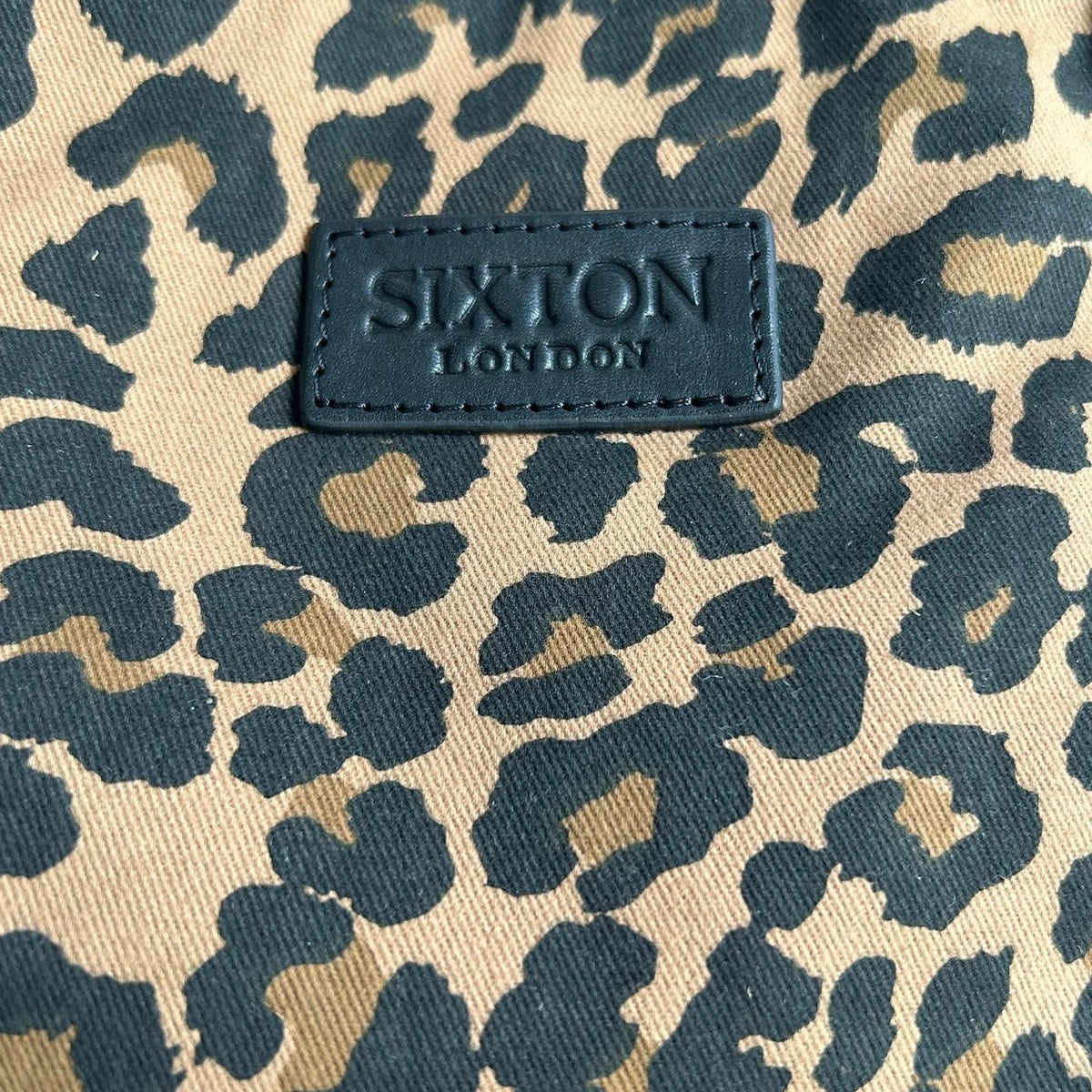 Heliotique | Sixton Leopard Print Backpack - Dark Brown & Black