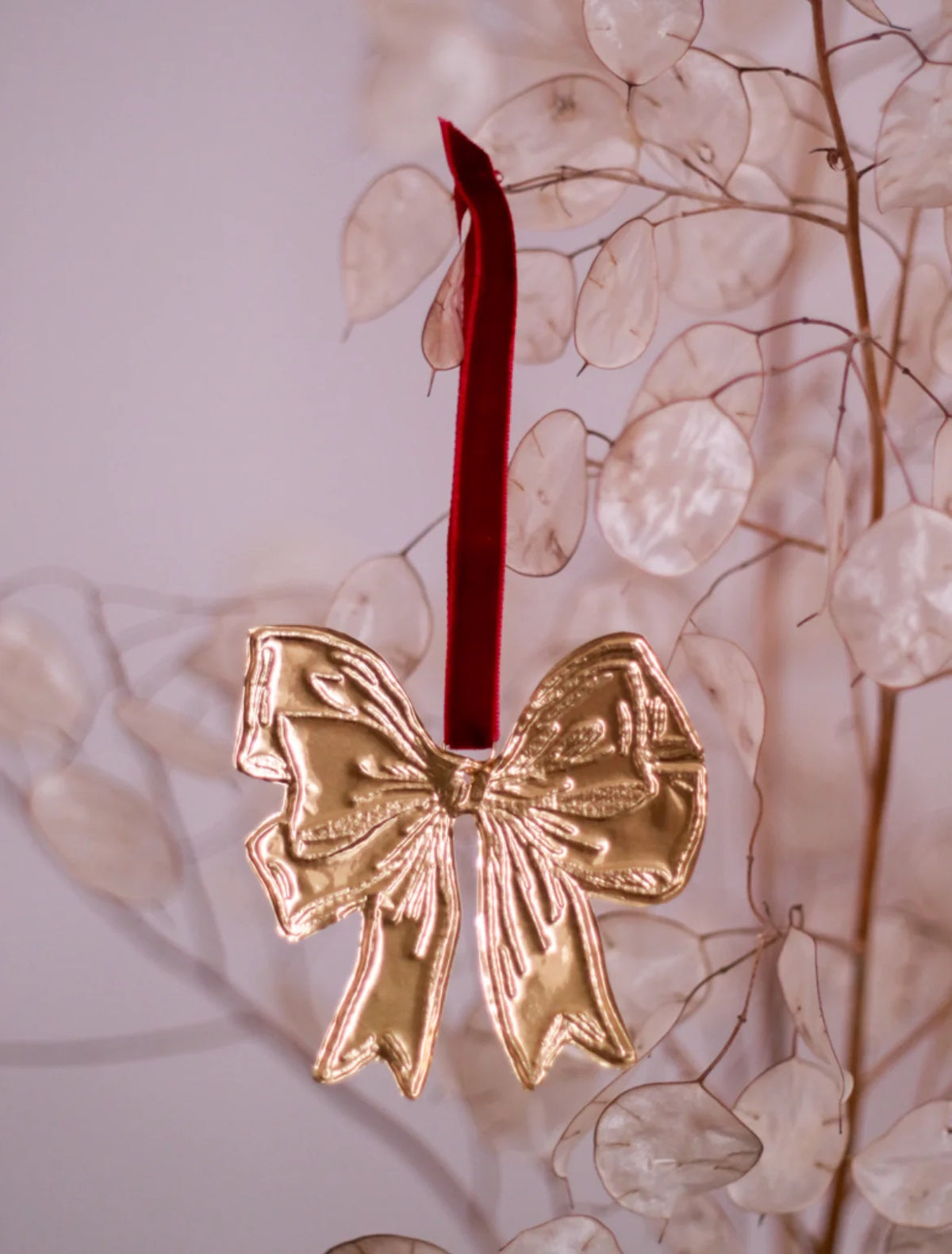 Heliotique | Megan Fatharly Embossed Tin Bow Hanging Ornament