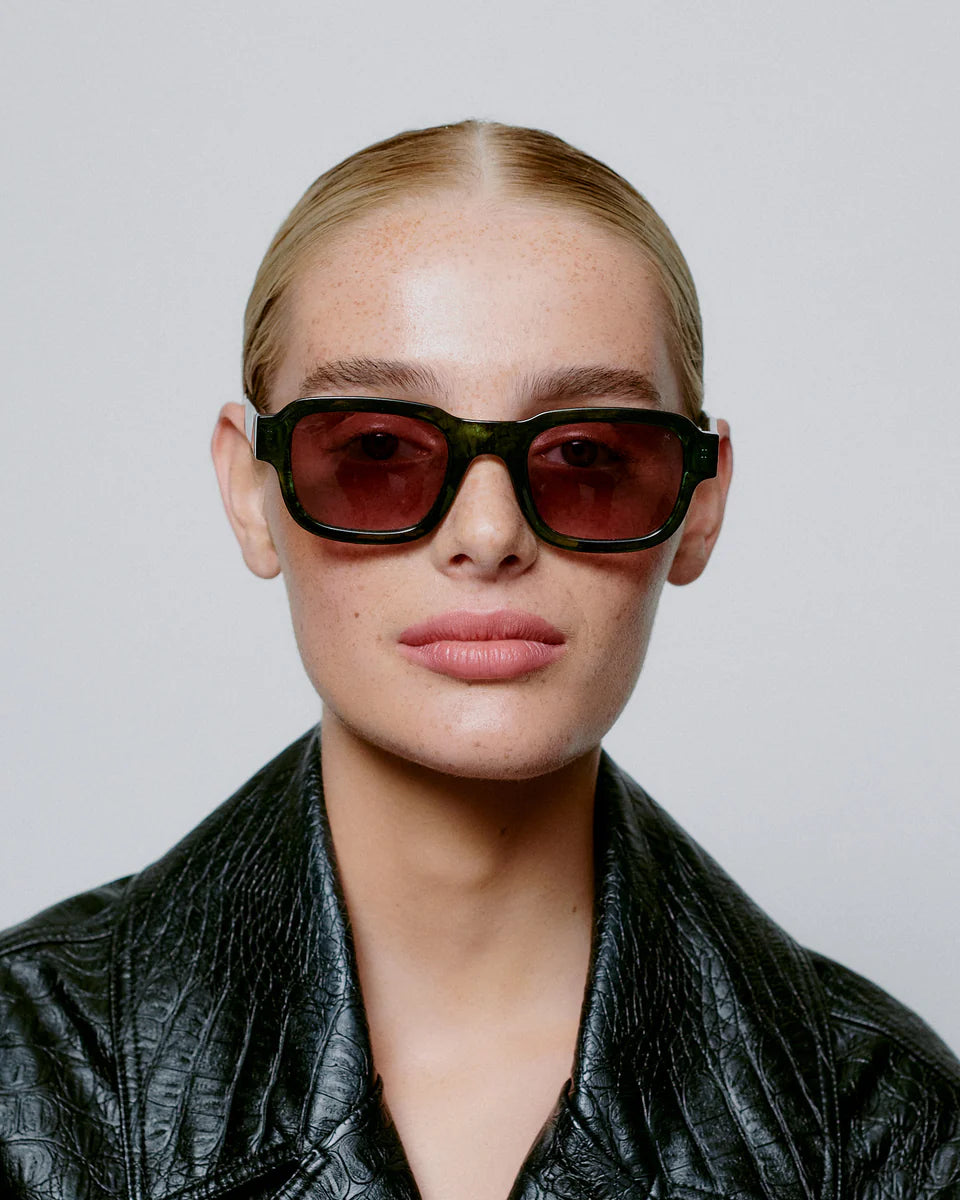 Heliotique Halo Sunglasses - Dark Green Transparent