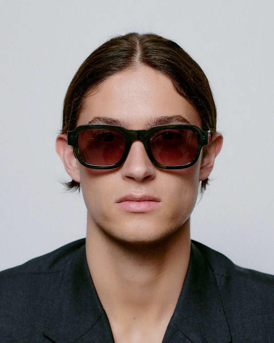 Heliotique Halo Sunglasses - Dark Green Transparent