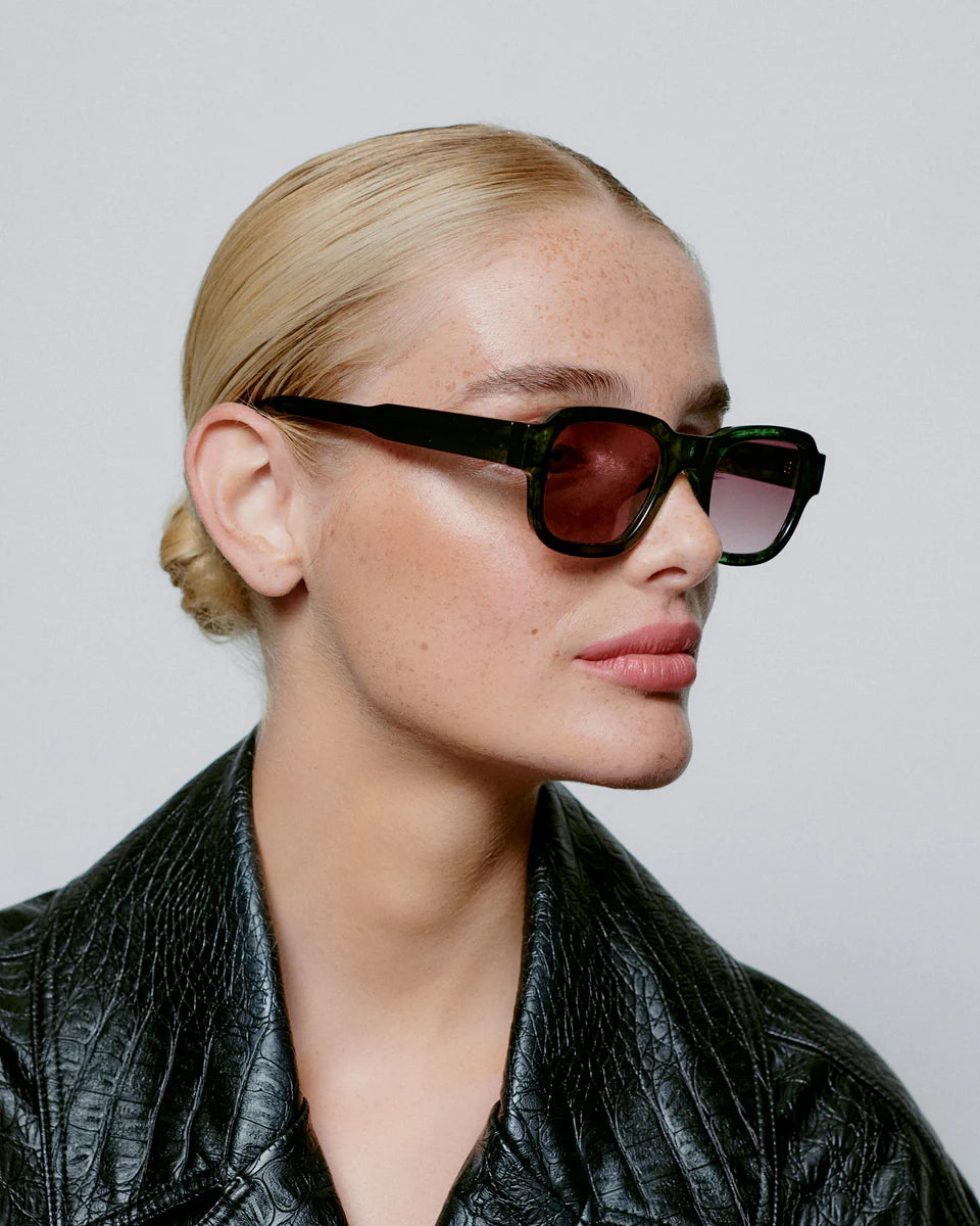 Heliotique Halo Sunglasses - Dark Green Transparent