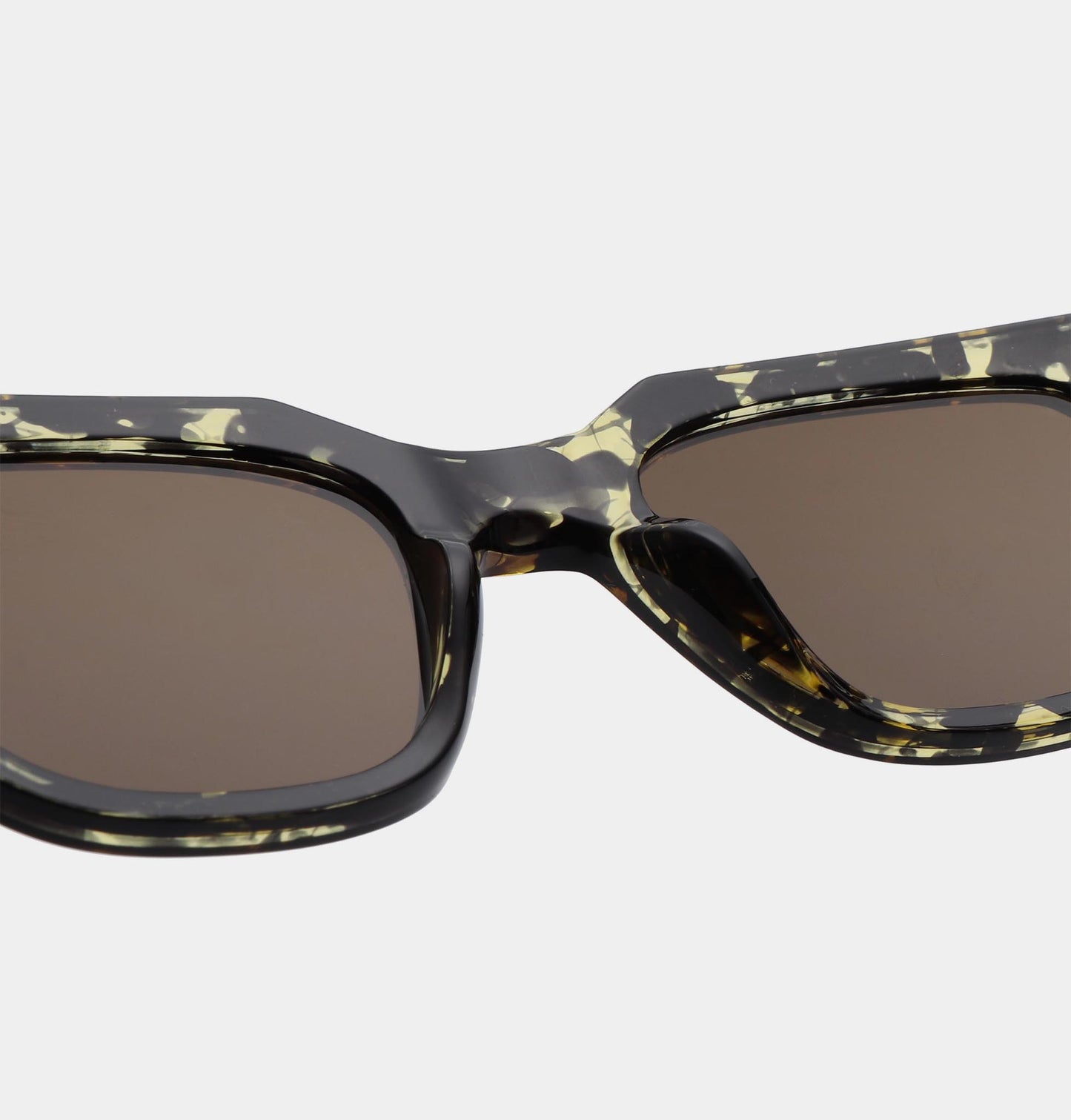Heliotique | A.Kjaerbede Kaws Sunglasses - Black / Yellow Tortoise