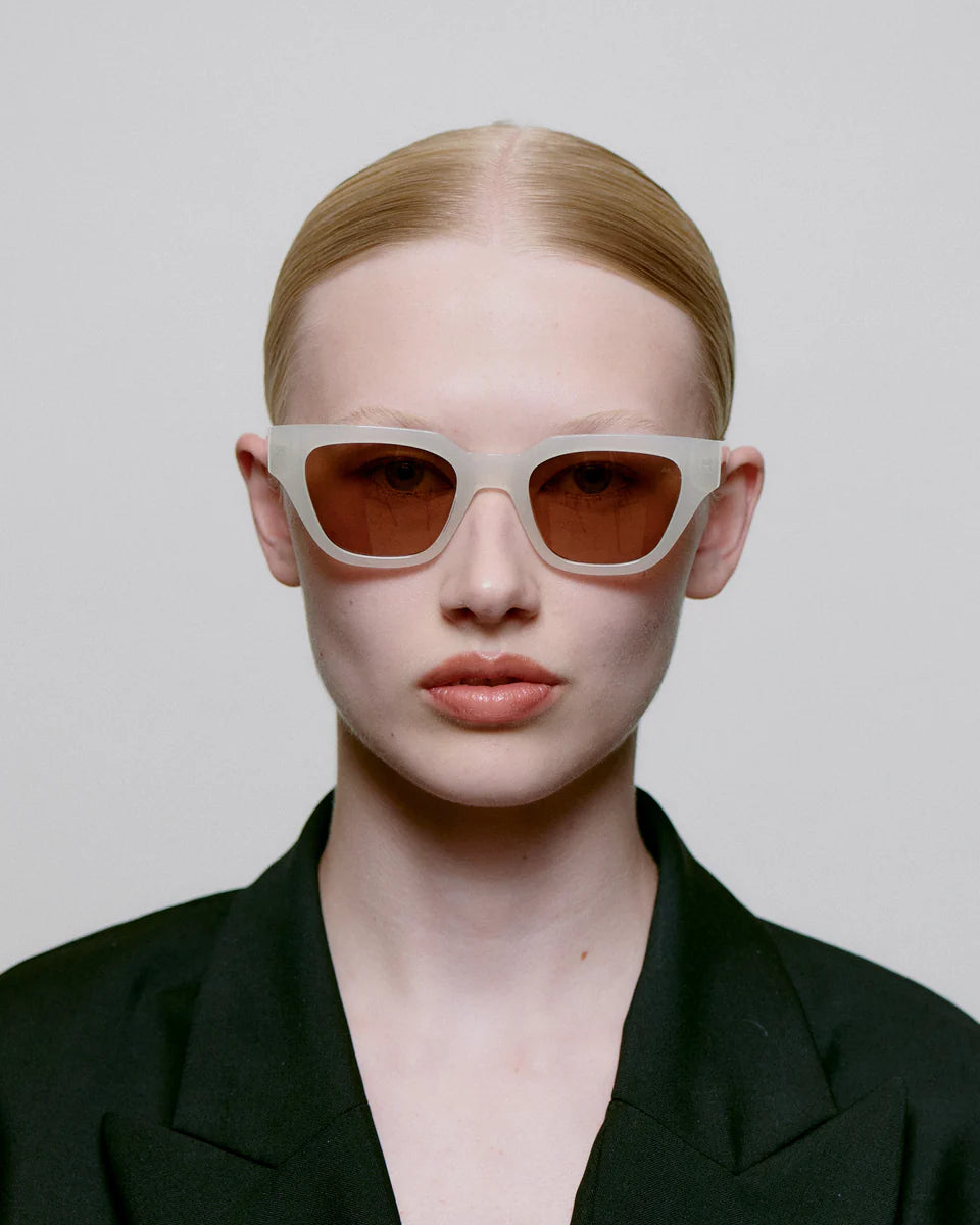 Heliotique Kaws Sunglasses - Cream Bone