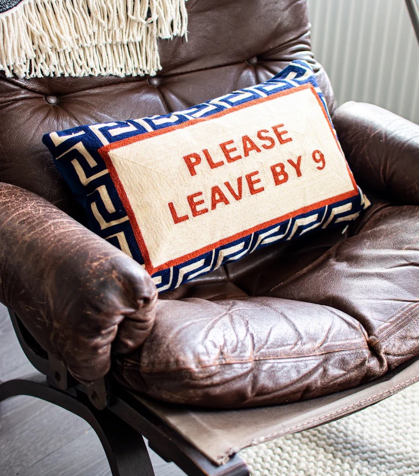 Heliotique | The Pillow Drop 'Please Leave By 9' Needlepoint Cushion