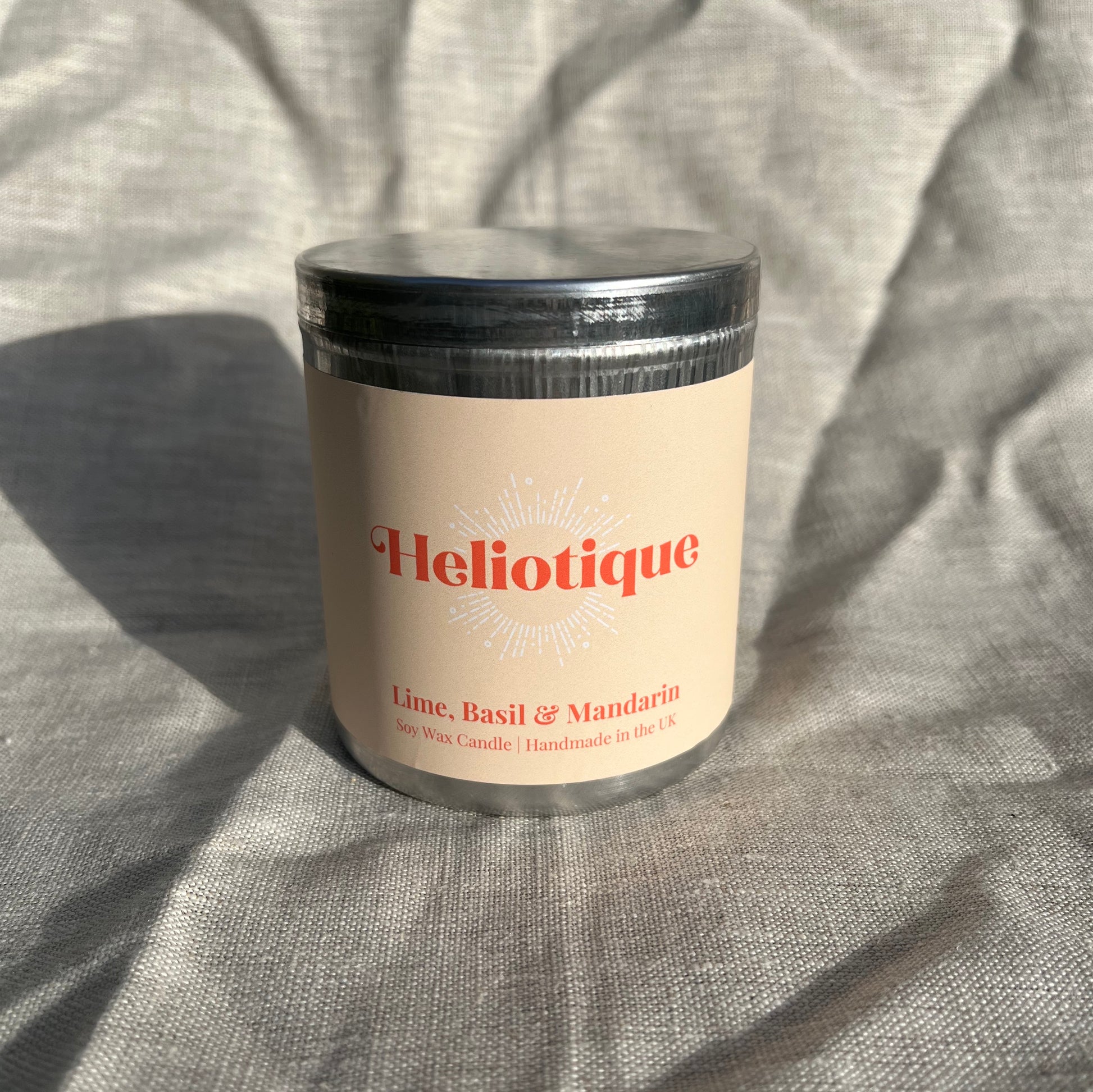 Heliotique | Heliotique Candle - Lime, Basil & Mandarin Tin Candle 