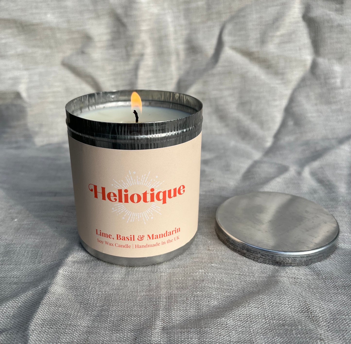 Heliotique | Heliotique Candle - Lime, Basil & Mandarin Tin Candle 