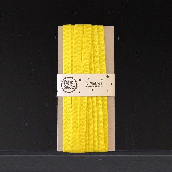 A 3m length of gorgeous, cotton herringbone ribbon in Yellow by independent brand Petra Boase.