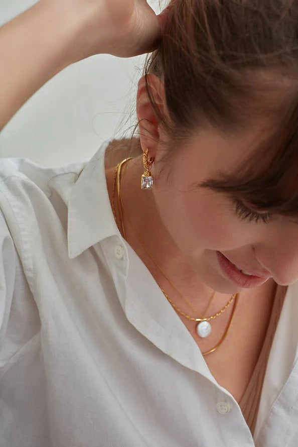 Heliotique | Shyla Margot Huggie Earrings - Champagne